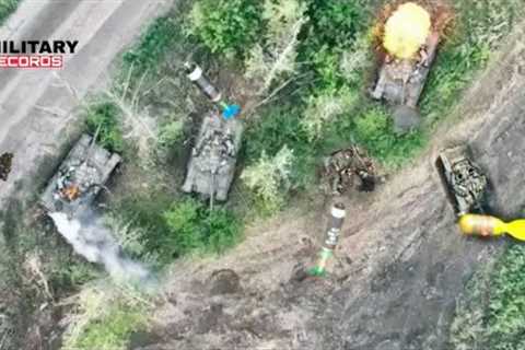 Horrible Footage! Drone Ukrainian dropping bombs to whole column russia armoured vehicles in Kherson