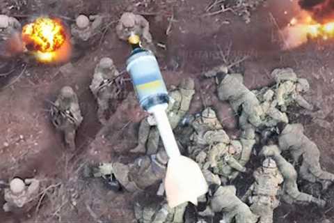 Insane footage of Ukrainian racing drones drop bombs on 320 Russian soldiers in trenches Bakhmut