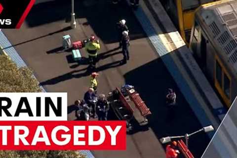 A child and man have died after a pram rolled onto train tracks | 7NEWS